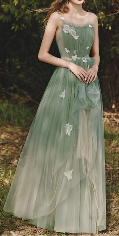 Discover the perfect outfit idea with our Forest Green Tulle Evening Gown, featuring delicate floral appliqués and a flattering A-line silhouette. Ideal for proms, weddings, and garden parties, this dress combines elegance and comfort. Shop now for a whimsical fairytale enchanted fairy ball style statement! Green Tulle Dress, Tulle Prom Dress Long, Prom Dress Green, Lace Long Prom Dress, Green Evening Dress, Prom Dresses Long Lace, Green Tulle, 2024 Prom, Lace Evening Gowns