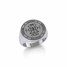 a silver ring with the seal of solomon on it