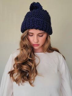 A dark blue hand-knit beanie that's the perfect autumn or winter accessory.  It's made with high quality thick yarn, making this a squishable, chunky, cozy hat. It's the perfect accessory for fall campfires, camping, hiking, or everyday outdoor activity. It has quite a bit of stretch and will fit comfortably on any adult size head. Note: Colors are photographed as accurately as possible. However, please allow for differences due to monitor settings and camera quality. This product was created in a smoke free, pet free home. Hand wash and lay flat to dry. Blue Soft Knit Beanie For Fall, Blue Knitted Hat For Fall, Knitted Blue Beanie For Fall, Blue Knitted Fall Hats, Blue Beanie For Fall, Blue Soft Knit Hat For Fall, Blue Crochet Beanie For Cold Weather, Blue Cozy Hat, Blue Soft Knit Beanie For Cold Weather