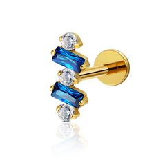 a pair of blue and clear crystal stone barbells with gold plated posts