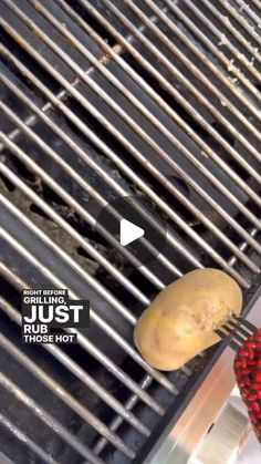 a person grilling food on top of a bbq with the word just above it