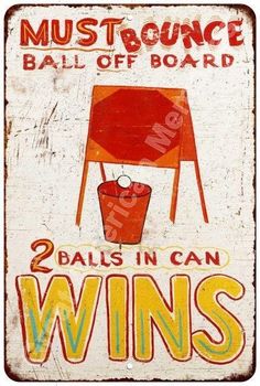 an old wooden sign advertising two balls in can wins, with the words must bounce ball off board