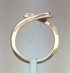 Hi This ring Has 2 diamonds, they are 1.5 mm, round shape, SI1 clarity, color g-h. The ring is made in 14k solid gold. The weight of the ring is 4.3 grams. I have 3 of this rings, one in white, one in yellow, and one in rose gold. The size of the rings is 7.75. I offer free sizing for this rings to any size. Please send me a message to let me know the color of the gold and the size that you need. If you have any questions please contact me. Thank you for visit my store. Modern 14k Gold Bypass Ring For Anniversary, Yellow Gold Bypass Ring With Tension Setting, Formal 14k Gold Bypass Ring With Tension Setting, Formal Yellow Gold Bypass Ring With Tension Setting, 14k Gold Bypass Ring With Vvs Clarity For Promise, Yellow Gold Bypass Ring With Tension Setting For Promise, Gold Bypass Ring With Tension Setting, 14k Gold Stackable Rings With Tension Setting, Gold Bypass Ring With Tension Setting And Round Cut