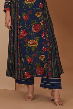 Blue anarkali with side intricate pleated panels, all over multi color floral, stripe print and placement metallic gota patti embroidery. Paired with straight pant and printed bordered dupatta. - Aza Fashions Traditional Ankle-length Anarkali Set With Printed Motifs, Traditional Ankle-length Salwar Kameez With Printed Motifs, Anarkali Style Printed Palazzo Set, Festive Straight Kurta With Printed Border Palazzo Set, Festive Palazzo Set With Straight Kurta And Printed Border, Traditional Ankle-length Palazzo Set With Printed Motifs, Bollywood Style Ankle-length Salwar Kameez With Printed Motifs, Diwali Ankle-length Palazzo Set With Printed Motifs, Festive Sharara With Printed Border And Straight Kurta