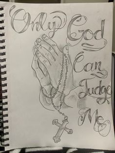 a drawing of a hand holding a rosary with the words, only god can judge me