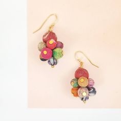 Small and subtle, these clustered earrings bring a touch of color to your day. Each piece is made from recycled Kantha textiles, so colors and patterns are all one-of-a-kind and will vary. Measures 1.5″ long and features nickel-, cadmium- and lead-free French hook ear wires. Sustainably handmade by women artisans in India. Multicolor Whimsical Earrings, Unique Multicolor Festive Earrings, Whimsical Multicolor Festival Earrings, Whimsical Multicolor Handmade Beaded Earrings, Handmade Whimsical Multicolor Beaded Earrings, Whimsical Handmade Multicolor Beaded Earrings, Adjustable Multicolor Fair Trade Earrings, Artsy Multicolor Beaded Earrings As Gift, Whimsical Multicolor Beaded Earrings As A Gift