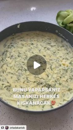 a pan filled with food sitting on top of a counter