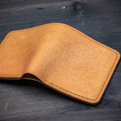 Bifold wallet made of vvegetable tanned Buttero (Walpier tannery, Italy) or Pueblo (Badalassi Carlo tannery, Italy) or Minerva (Badalassi Carlo tannery, Italy) leather. Leather thickness is ±1,4mm / 3.5oz Check colors here: https://www.etsy.com/listing/842671392/leather-colors-for-my-listings Wallet measurements: 9.5x10.5 cm / 3.74x4.13 inches when folded. There are 4 card slots, each can hold few cards and slot for paper money. The edge have been carefully waxed and polished. Wallet is stitched Vegetable-tanned Bifold Wallet For Daily Use, Daily Use Vegetable-tanned Bifold Wallet, Daily Vegetable-tanned Bifold Wallet, Leather Colors, Leather Bifold Wallet, Bifold Wallet, Paper Money, Vegetable Tanned Leather, Wallet Men