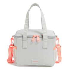 a gray and pink bag with orange straps on the handle, sitting against a white background