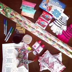 various items are laid out on the table to be used for making christmas gifts and crafts