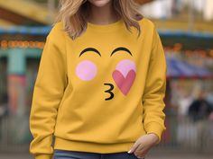 Express with Emoji: Yellow Shirt Collection 😀 Elevate your wardrobe with our emoji-inspired yellow shirts, adding a dash of fun and expression to your style. Why Choose Our Emoji Yellow Shirts? ✨ Support a Small Business: Your purchase directly supports our creative journey, helping us bring more cheerful designs to life. 😃 Express Yourself: Wear the iconic emoji face proudly and let your emotions shine through your fashion. 🌟 Premium Quality: Crafted with care, our shirts offer comfort and vibrant style, perfect for a pop of color. 🎁 Perfect Gift: Share the joy of expression with a friend, and gift them a shirt that's as bright as their smile. Join us in celebrating the art of expression. Shop now and add a touch of cheerfulness to your attire! 𝐏𝐑𝐎𝐂𝐄𝐒𝐒𝐈𝐍𝐆 𝐓𝐈𝐌𝐄 𝗔𝗡𝗗 𝐒? Yellow Casual Sweatshirt With Cartoon Print, Cute Yellow Long Sleeve Sweatshirt, Trendy Yellow Long Sleeve T-shirt, Trendy Long Sleeve Yellow T-shirt, Cute Yellow Sweatshirt For Fall, Cute Yellow Crew Neck Sweatshirt, Trendy Yellow Sweatshirt With Letter Print, Trendy Yellow Tops With Cartoon Print, Trendy Yellow Crew Neck Sweatshirt