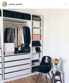 an image of a closet with clothes on it