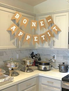 a banner that says bone it appetizing on the kitchen counter