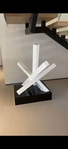 an abstract sculpture in the middle of a room