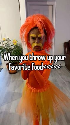 a person wearing an orange and yellow costume with the words, when you throw up your favorite food > >