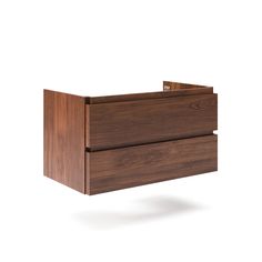 an empty wooden drawer on a white background