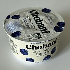 an ice cream container with blueberries on it