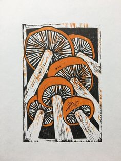 an orange and white print with mushrooms in the background on a piece of paper that has been altered to look like wood