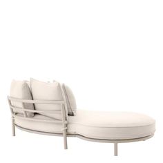 a white chaise lounge chair with pillows on it's back and armrests