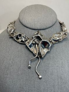 Gorgeous abstract, modernist handmade, one of a kind necklace. Made by Marksz out of Palm Beach. Lovely crinkle design. Marksz and his wife have been making one of a kind jewelry for over 30 years. 46.9 grams. 18 inches neck length. Marked DMW. Acid tested for sterling. Mint condition. Handmade Sterling Silver Contemporary Necklace, Contemporary Silver Jewelry With Artistic Design, Contemporary Sculptural Jewelry For Formal Occasions, Unique Hand Cast Silver Necklace, Contemporary Silver Jewelry With Unique Design, Handmade Modernist Necklace For Formal Occasions, Contemporary Sterling Silver Necklaces, Hand Cast Modernist Jewelry For Gifts, Modernist Hand-cast Jewelry For Gifts