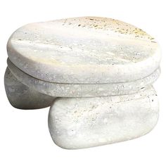 two white rocks stacked on top of each other