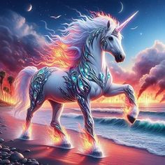 a unicorn standing on top of a beach next to the ocean