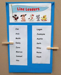 a bulletin board with the name line leaders written on it and pictures of cartoon dogs