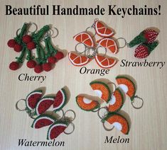 four different key chains with fruit and berries on them, each one has a name that says beautiful handmade key chains