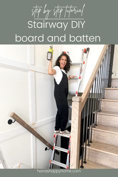 a woman standing on top of a step ladder next to a stair case with the words stairway diy board and batten