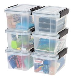 five plastic storage containers stacked on top of each other