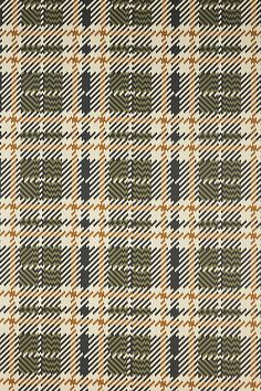 a checkered fabric with brown and white colors