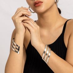 Description:Geometric Abstract V Shaped Pattern Bold Cuff BraceletSpecification:Size: 2.3" * 3.1"Weight: 1.22 oz/pcsMaterial: Alloy MetalColor: Gold/SilverFeatures & Details:The price quoted is for one piece of bold cuff bracelet only.This geometric abstract V shaped pattern cuff bracelet is made of nickel-free. lead-free. cadmium-free and hypoallergenic materials. which will not turn your skin green or cause anaphylactic reaction.It is easy to match your different outfits and also suitable for Shiny Bracelets, Wrist Accessories, Style Hip Hop, Enamel Bracelet, Different Outfits, Geometric Abstract, Silver Cuff Bracelet, Girls Jewelry, Cuff Bangles