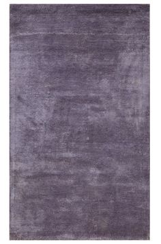 an area rug with dark purple colors