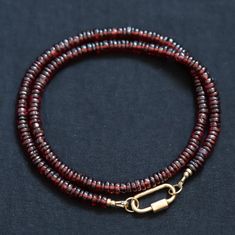 Want to save 15% off your first order? Sign up for our newsletter by visiting our website and filling out the pop up form. Receive a code by email, then send us that code through Etsy messages to save 15% off your ETSY order, sign up here: www.earthlyabundancejewelry.com  Garnet: vitality, passion, warmth, confidence Available with two different carabiner options: White topaz [100% GENUINE stone] Plain screw carabiner [3 microns of gold on sterling silver] D E T A I L S △ Handmade in Vancouver △ Garnet Beaded Necklaces As Gift, Garnet Bead Necklaces For Gifts, Garnet Round Bead Necklace For Gift, Garnet Round Beads Necklace For Gift, Red Garnet Round Beads Jewelry, Garnet Round Beads Jewelry For Gifts, Garnet Jewelry With Faceted Beads For Gift, Garnet Jewelry With Faceted Beads As A Gift, Garnet Jewelry With Faceted Round Beads