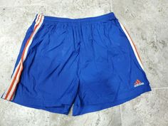 VINTAGE 1990'S ADIDAS NYLON SOCCER SHORTS MEN'S SIZE XL GREAT COLORWAY!!!. Shipped with USPS First Class Package (2 to 3 business days). Very nice colorway pair of 1990's Adidas soccer shorts in men's size XL. THESE ARE THE ONLY SHORTS IN THIS COLORWAY FOR SALE ON EBAY!!! The shorts have a drawstring and pockets. Made of 100% nylon, these shorts look great. No real issues to report other than some minor dirtiness and wrinkling from being in storage. Please keep in mind older shorts like these ru Adidas Sports Nylon Shorts, Adidas Nylon Sports Shorts, Adidas Sporty Nylon Shorts, Adidas Summer Streetwear Athletic Shorts, Adidas Soccer Shorts, Soccer Shorts, Adidas Soccer, Looks Great, Mens Short