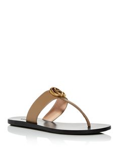 Gucci Designer Sandals With Single Toe Strap, Designer Gucci Sandals With Single Toe Strap, Chic Gucci Sandals With Single Toe Strap, Elegant Gucci Flat Sandals, Luxury T-strap Sandals With Single Toe Strap, Luxury Summer T-strap Toe Post Sandals, Luxury T-strap Sandals For Beach, Luxury Toe Post T-strap Sandals For Summer, Designer Toe Post Sandals