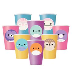 six different colored cups with faces on them