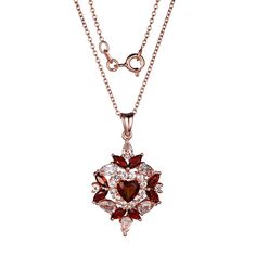 Rose Gold-Plated Garnet and White Topaz Cluster Pendant with Chain  This gorgeous, garnet cluster pendant is sure to add an elegant touch to any ensemble. It features rich, red garnets embellished with sparkling white topaz accents in a rose gold-plated, sterling silver setting.       Pendant approx. 32.8mm x 18.9mm      Chain approx. 18"L     Stamped .925; rose gold-plating     Star-shaped cluster pendant features heart- and marquise-cut red garnets and round and pear-cut white topaz     Cable Elegant Garnet Necklaces For Weddings, Elegant Garnet Necklace For Wedding, Elegant Burgundy Jewelry For Valentine's Day, Elegant Garnet Pendant Necklace, Elegant Burgundy Garnet Necklaces, Garnet Heart, Color Bands, Pendant With Chain, Cluster Pendant