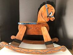 an old wooden rocking horse on display