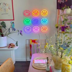 a living room filled with furniture and lots of neon signs on the wall above it