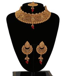 "This Gorgeous wedding necklace set with an intricate design in 22KT antique gold plating. This high quality choker necklace deco intermittently studded around with clear synthetic stones and complete with pair of matching earrings and tikka. 1 x Necklace approx. 4 inches Collar-Wide . Back adjustable rope is attached. 1 x Pair of Earrings 3\" Length from top to bottom. *Adjustable & Appropriate for All Neck Sizes. Perfect for a bride in wedding or party wear jewelry set. Visit my store: htt Gold Choker With Intricate Design For Wedding, Gold Wedding Choker With Intricate Design, Gold Kundan Choker With Intricate Design, Ornate Gold Choker With Intricate Design, Ornate Filigree Jewelry Sets For Wedding, Gold Plated Temple Jewelry Choker For Wedding, Gold Choker Jewelry Sets For Ceremonial Occasions, Gold Plated Choker Necklace For Wedding, Gold Choker Bridal Necklace For Wedding