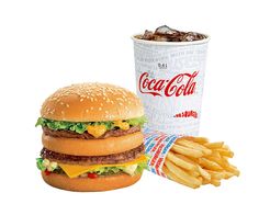 a hamburger and fries are next to a cup of soda on a white background,