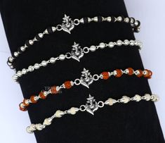 Metal-925 sterling silver. Item type-Rakhi Bracelet. Length-6 inches.to 9 inches (select you size from option ) Weight-6.500 grams.(weight will be vary as per length) Center piece size-2.1 cm beads size-5 mm approx. Stamped-925. Thank You and Happy Shopping! Spiritual Silver Bracelets For Diwali, Sterling Silver Bracelets For Festivals, Sterling Silver Bracelets With Silver Beads For Festive Occasions, Festive Sterling Silver Bracelets With Silver Beads, Traditional White Sterling Silver Bracelets, Handmade Sterling Silver Bracelets For Puja, Traditional Silver Beads Bracelets For Puja, Traditional Handmade Sterling Silver Beaded Bracelets, Traditional Silver Beaded Bracelets For Puja