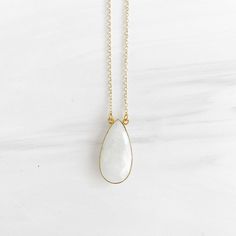 A one of a kind, unique necklace - this contemporary piece features a large moonstone pendant and offers tons of statement in its elegance. GEMSTONE: Moonstone SIZE: 1.25" long CHAIN: 18" long 14k gold filled CLOSURE: Lobster clasp Unique Necklace, Moonstone Pendant, Gems Jewelry, Long Chain, Gold Pendant Necklace, Unique Necklaces, Gemstone Necklace, Gold Pendant, Lobster Clasp