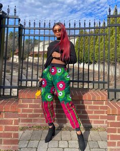 A Smart UNISEX Ankara joggers😍.  🌸 Suitable for all weathers 🌸 FEATURES  ✔️Joggers has a stretch band on the waist with a drawstring. ✔️It has a stretch band on the ankle. ✔️It has a loose fit. ✔️It has 2 Side pockets and 1 back pocket. ✔️Made with high quality African print fabric.  ‼️CUSTOM ORDER!! Production usually takes 2 - 14 days.  Measurement needed:  ✔️Hips circumference  ✔️Pants length.  (If you're having difficulties  providing the measurements, please send us a message. We would be glad to assist you)   💙THANK YOU FOR SHOPPING WITH US💙 Green Non-stretch Cotton Cargo Pants, Green Loose Fit Pants For Streetwear, Baggy Pink Hip Hop Pants, Pink Baggy Hip Hop Pants, Hip Hop Green Wide Leg Bottoms, Green Cotton Hip Hop Cargo Pants, Green Baggy Hip Hop Bottoms, Non-stretch Full Length Green Cargo Pants, Multicolor Straight Leg Pants For Streetwear