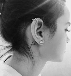 a woman with ear piercings on her ears