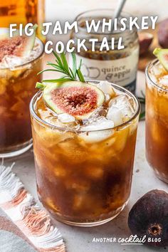 fig jam whiskey cocktail with fresh figs and rosemary garnish in the background