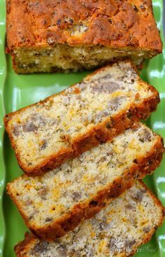 sausage and cheese bread on a green plate with text overlay that reads sausage and cheese bread