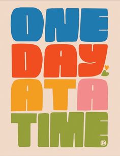 the words one day at a time are in multicolored letters