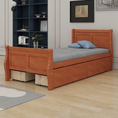 a bedroom with a bed, bookshelf and rug